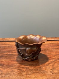 A Chinese carved bamboo 'lotus' libation cup, 17/18th C.