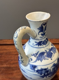 A Chinese blue and white ewer with landscape design, Transitional period