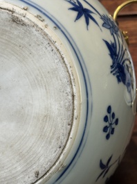 A Chinese blue and white covered bowl with floral design and gilt bronze mounts, Transitional period