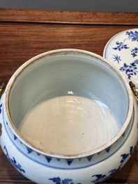 A Chinese blue and white covered bowl with floral design and gilt bronze mounts, Transitional period