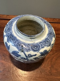 A Chinese blue and white 'Buddhist lion and lotus scroll' jar, Wanli