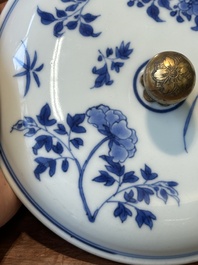 A Chinese blue and white covered bowl with floral design and gilt bronze mounts, Transitional period