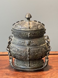 A Chinese bronze ritual wine vessel and cover, 'you', Yuan/Ming