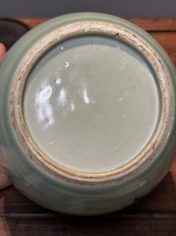 A Chinese celadon-ground blue, white and copper-red ginger jar with reticulated wooden cover and stand, 18th C.