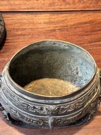 A Chinese bronze ritual wine vessel and cover, 'you', Yuan/Ming