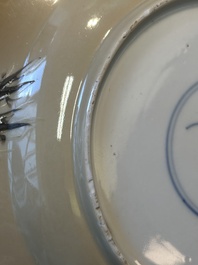 A Chinese famille verte caf&eacute;-au-lait ground plate and a monochrome white plate, Kangxi