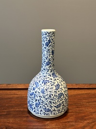 A Chinese blue and white 'lotus scroll' bottle vase, Yongzheng mark and possibly of the period