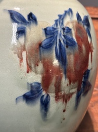 A Chinese celadon-ground blue, white and copper-red ginger jar with reticulated wooden cover and stand, 18th C.