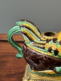 A pair of Chinese sancai-glazed chicken ewers mounted as candleholders with gilt bronze, Kangxi