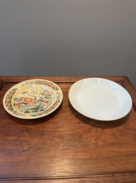 A Chinese famille verte caf&eacute;-au-lait ground plate and a monochrome white plate, Kangxi