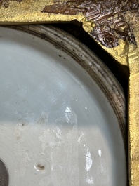 Een Chinese blauw-witte en koperrode 'draken' vaas met verguld bronzen montuur, 18e eeuw