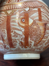 A Chinese iron-red-decorated and gilt 'dragon and carp' bottle vase, 19/20th C.