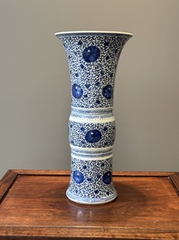 A Chinese blue and white 'chrysanthemum scroll' 'gu' vase, Kangxi