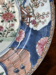 A pair of Chinese famille rose bowls and four plates, Yongzheng/Qianlong