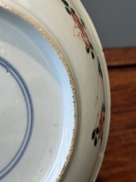 A Chinese famille verte 'qilin and falcon' plate, artemisia leaf mark, Kangxi