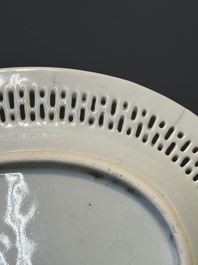 An oval Chinese Canton famille rose dish with a reticulated border, 19th C.