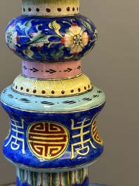 A large Chinese Canton enamel blue-ground 'shou' candlestick, Qianlong/Jiaqing
