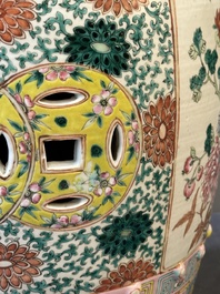 A Chinese famille rose garden seat with birds among blossoming branches, 19th C.