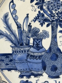 A Chinese blue and white 'antiquities' dish, Kangxi