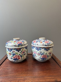 A pair of large Chinese famille rose jars and covers with floral design, Qianlong