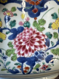 A pair of large Chinese famille rose jars and covers with floral design, Qianlong