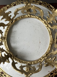 A Chinese famille rose 'flower basket' dish with gilt bronze mount, Yongzheng