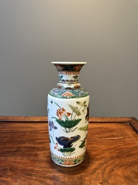 A Chinese famille verte 'mandarin duck and lotus' rouleau vase , 19th C.