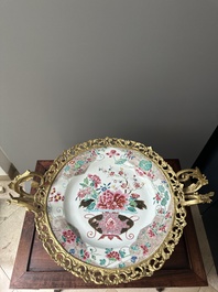 A Chinese famille rose 'flower basket' dish with gilt bronze mount, Yongzheng