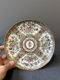 A pair of Chinese Canton famille rose monogrammed plates and a large '100 butterflies' tray, 19th C.