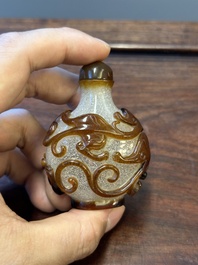 A rare Chinese brown-overlay white glass snuff bottle with chilong design, Qianlong/Jiaqing