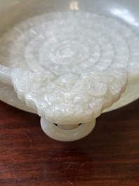 An important Chinese chrysanthemum-shaped very pale celadon jade marriage bowl, 18th C.