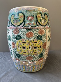 A Chinese famille rose garden seat with birds among blossoming branches, 19th C.