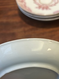 A 28-piece Chinese puce-enamelled and gilt armorial tea service with crowned monograms, Qianlong