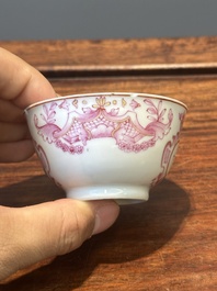 A 28-piece Chinese puce-enamelled and gilt armorial tea service with crowned monograms, Qianlong