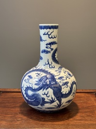 A Chinese blue and white 'dragon' bottle vase, Yongzheng mark, 19th C.