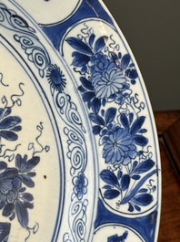 A Chinese blue and white 'antiquities' dish, Kangxi