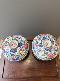 A pair of large Chinese famille rose jars and covers with floral design, Qianlong