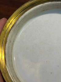 A Chinese famille verte cylindrical box and cover with gilt bronze mount, Kangxi