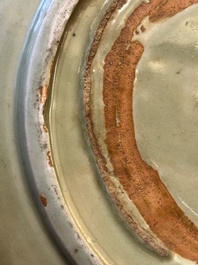 A Chinese Longquan celadon dish with floral anhua design, Ming