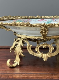 A Chinese famille rose 'flower basket' dish with gilt bronze mount, Yongzheng
