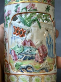 A pair of Chinese reticulated Canton famille rose brush pots, 19th C.