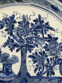 A Chinese blue and white 'antiquities' dish, Kangxi