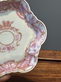 A 28-piece Chinese puce-enamelled and gilt armorial tea service with crowned monograms, Qianlong