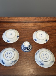 Four Chinese blue and white saucers and an 'erotic' cup, Kangxi