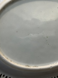 An oval Chinese Canton famille rose dish with a reticulated border, 19th C.