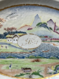 An oval Chinese monogrammed Canton famille rose dish with landscape design, 19th C.