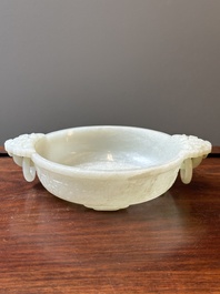 An important Chinese chrysanthemum-shaped very pale celadon jade marriage bowl, 18th C.