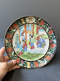 A pair of Chinese monogrammed Canton famille rose plates with black-glazed rims, 19th C.