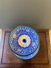 A large Chinese Canton enamel blue-ground 'shou' candlestick, Qianlong/Jiaqing