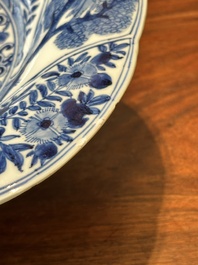 Four Chinese blue and white lobed 'phoenix and monkey' plates, flower mark, Kangxi